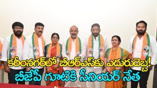 Former BRS corporator Sadhaveni Srinivas and Urban Bank director Bandi Prashanth joining BJP in presence of Bandi Sanjay