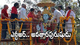People offering floral tributes at the NTR statue in Film Nagar during the death anniversary remembrance ceremony.