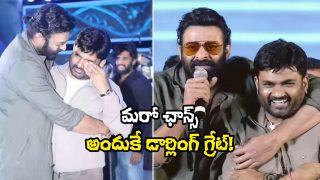 Prabhas warmly embraces director Maruthi during a public event, showcasing their bond and mutual respect on stage.